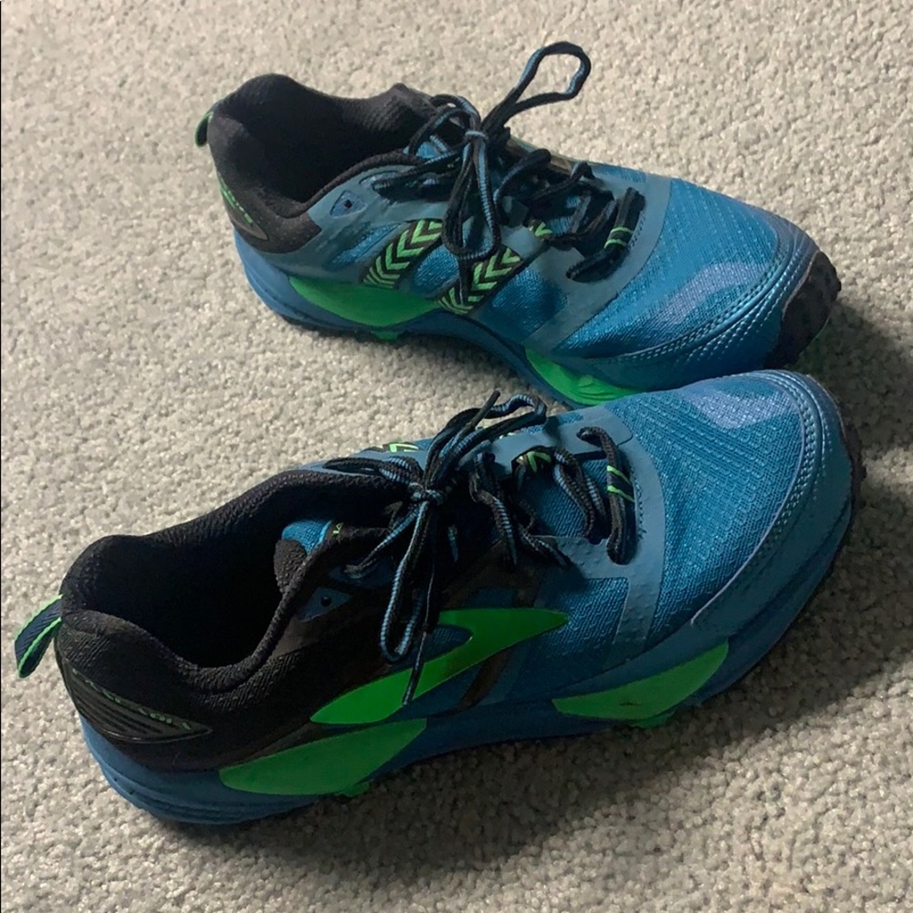 Brooks. Only wore once. Perfect shape